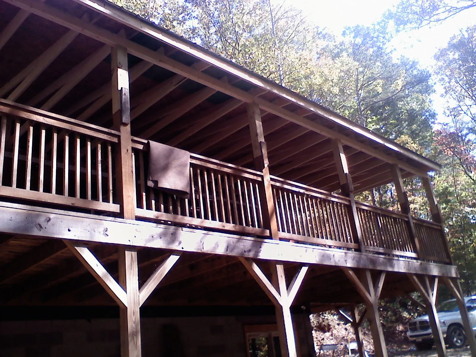 Timber framing under a new elevated porch and deck — Roof Leak Repair in Prairie Grove by Roofing Brothers